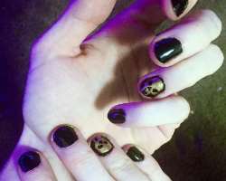 Nathan got special nail art done for Halloween.
